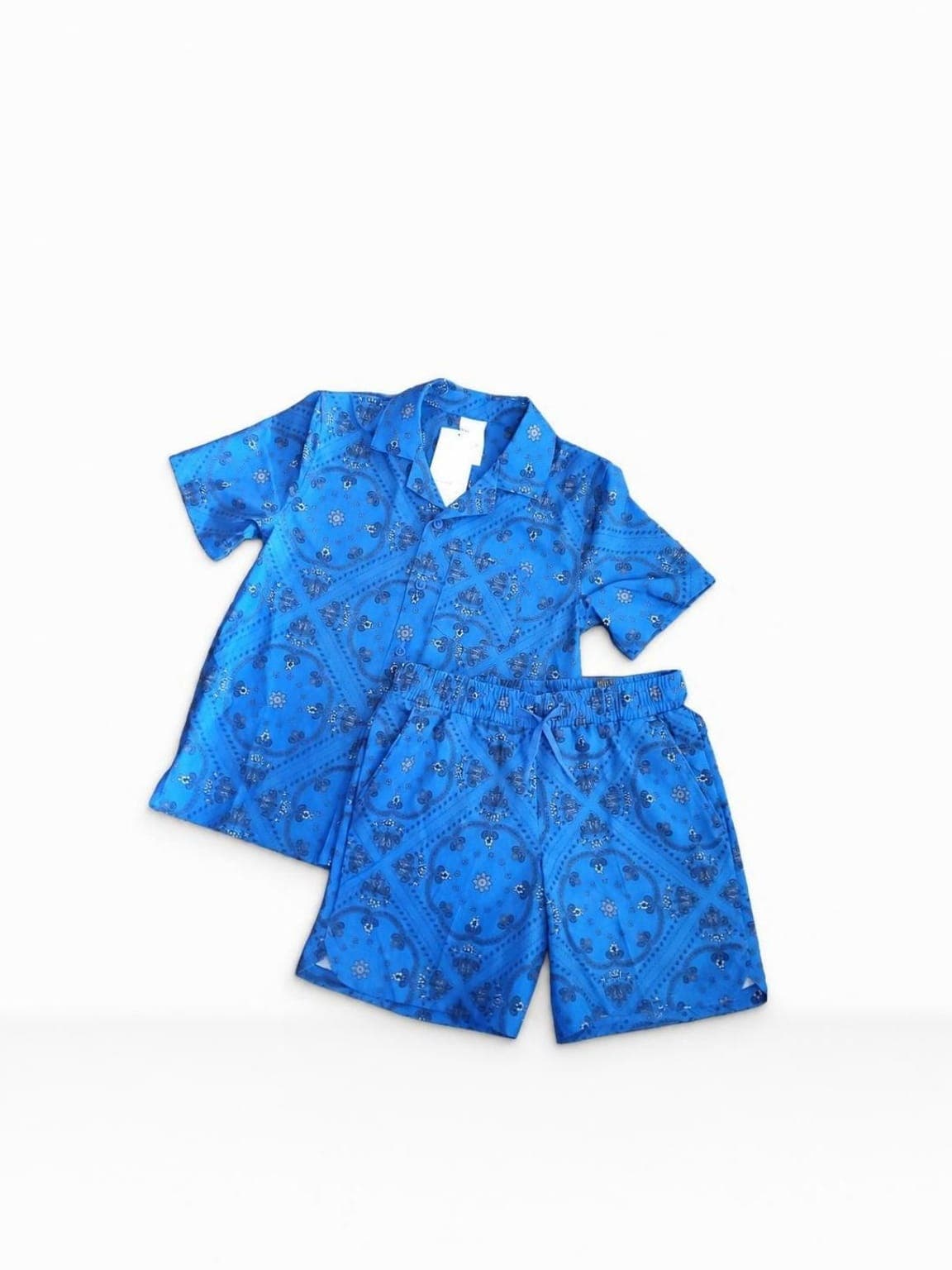 Professional Shopify product image of a blue matching outfit on a clean white backdrop after Portrait Drop