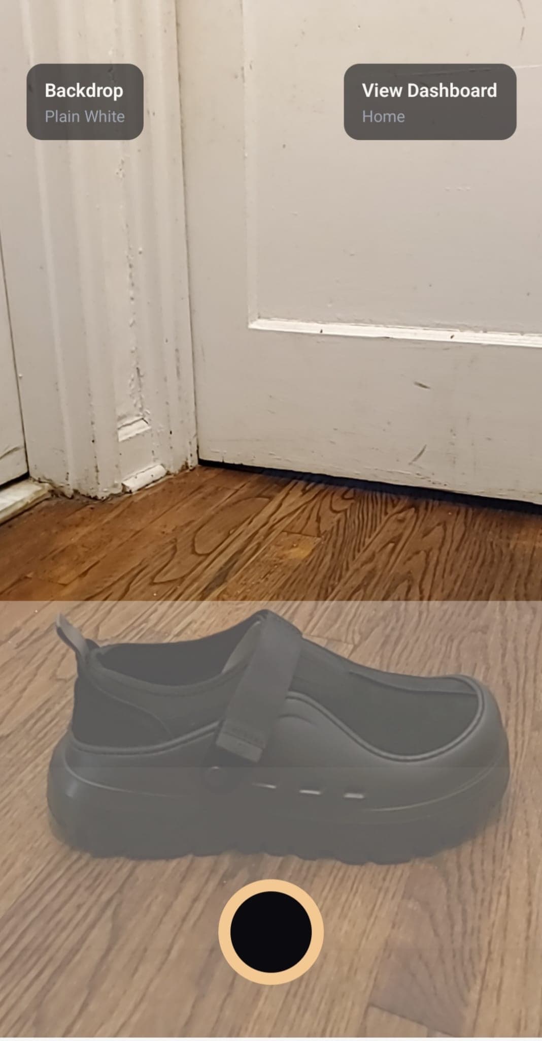 Portrait Drop Android camera screen capturing a black shoe product photo